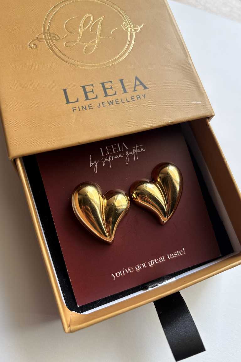 Love bomb Heart Studs